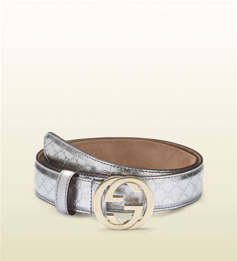 gold and silver gucci belt